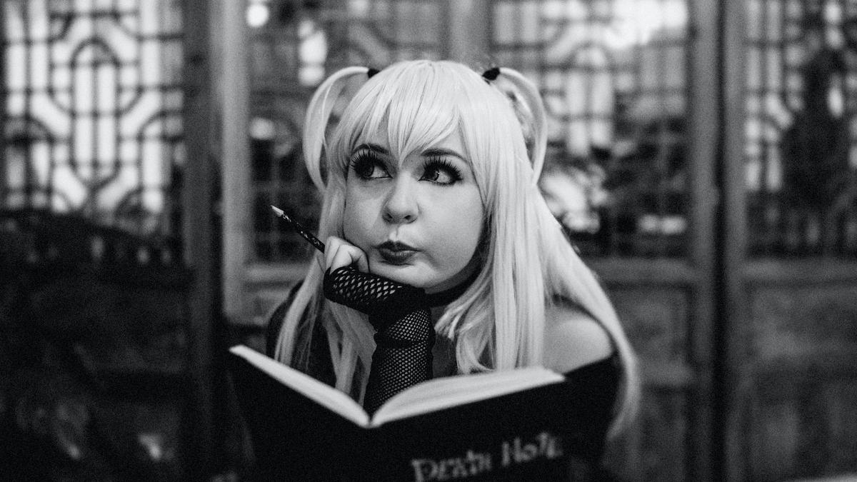 Woman holding the Death Note